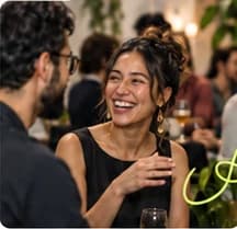 People sharing a conversation around a table